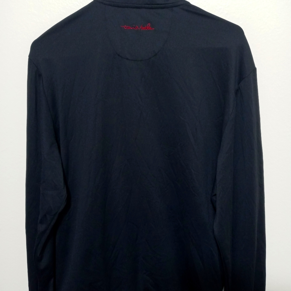 Travis Matthew zip up jacket.